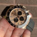 Rolex Daytona Cosmograph Rose Gold Dial 9 Rolex Daytona 116515LN-0018 held in hand