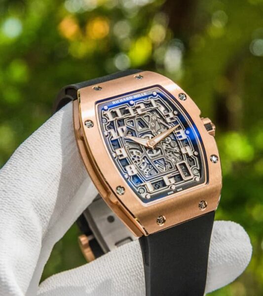What Stories Hide Behind Richard Mille Rose Gold Icons? 5 Richard Mille RM 67-01 Extra Flat Rose Gold featuring ultra-thin rose gold case and red rubber strap.